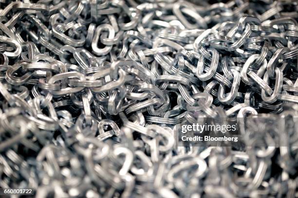 Chains sit in a bin after electro zinc plating during production at the Pewag Inc. Manufacturing facility in Pueblo, Colorado, U.S., on Wednesday,...