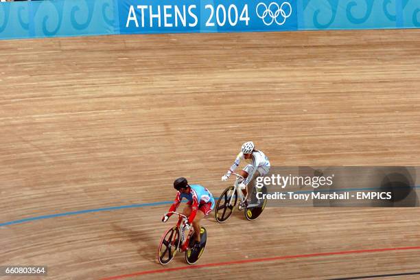 Canada's Lori-Ann Muenzer looks back to check the distance of her oppenant Venezula's Daniela Greluis Larreal Chrinos