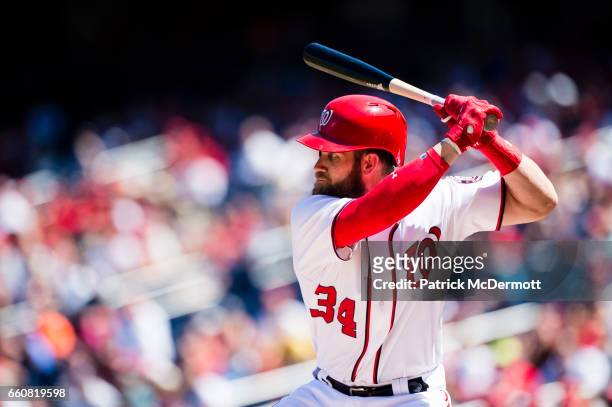 Bryce Harper of the Washington Nationals bats against the Colorado Rockies in the first inning during a MLB baseball game at Nationals Park on August...