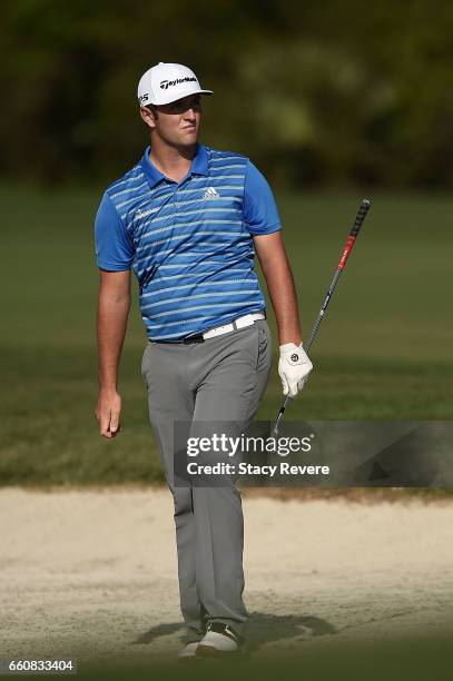 Jon Rahm of Spain watches his third shot on the 15th hole during the first round of the Shell Houston Open at the Golf Club of Houston on March 30,...