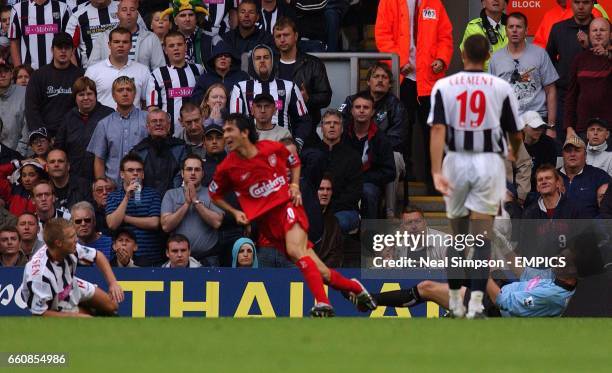 West Bromwich Albion's Martin Albrechtsen, Neil Clement and goalkeeper Russell Holt look dejected as Liverpool's Luis Garcia turns away after scoring...