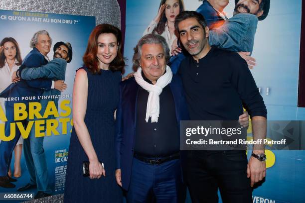 Actors of the movie, Elsa Zylberstein, Christian Clavier and Ary Abittan attend the "A bras ouverts" Paris Premiere at Cinema Gaumont Opera on March...