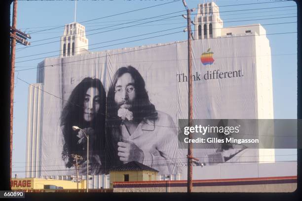 Billboard depicting John Lennon and Yoko Ono promotes Apple Computers August 1, 1998 in Los Angeles, CA. Numerous famous and historical figures are...