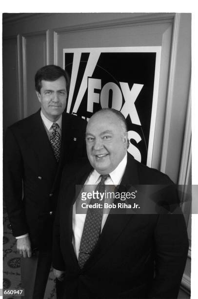 News anchors Roger Ailes and Brit Hume stand together January 14, 1997 in Los Angeles, CA. The anchors gathered for a press event to publicize a new...
