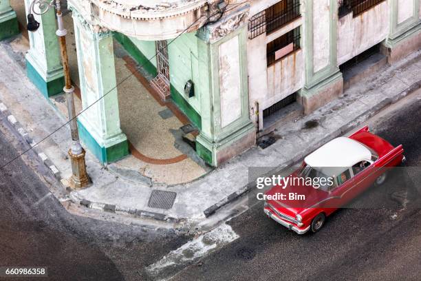 red car in havana - elevated view of corner stock pictures, royalty-free photos & images