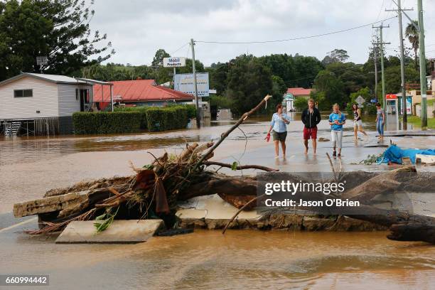 Residents look at the damage on March 31, 2017 in South Murwillumbah, Australia. Heavy rain has caused flash flooding in south east Queensland and...