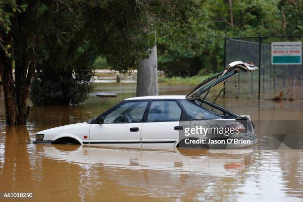 Car is seen submerged on March 31, 2017 in Billinudgel, Australia. Heavy rain has caused flash flooding in south east Queensland and Northern New...