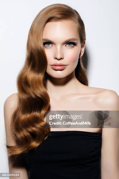 studio shot of young beautiful woman - high fashion hair stock pictures, royalty-free photos & images