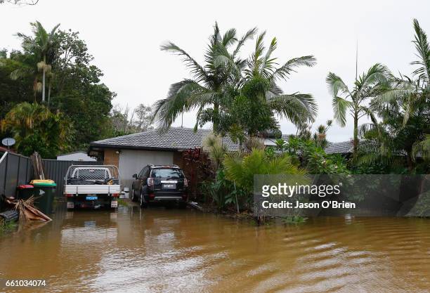 Houses threatened by flood water on March 31, 2017 in Ocean Shores , Australia. Heavy rain has caused flash flooding in south east Queensland and...