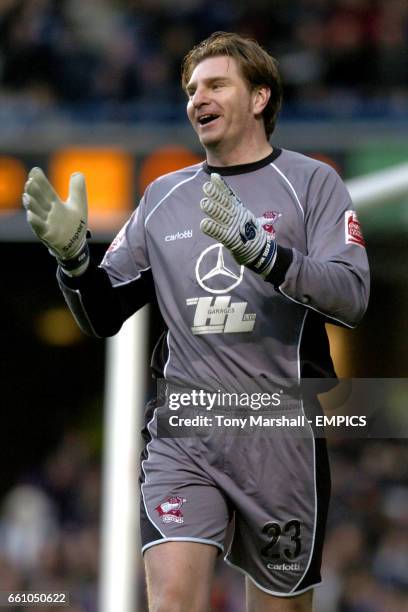 Scunthorpe United goalkeeper Paul Musselwhite celebrates his side taking the lead at Stamford Bridge