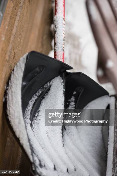 snow shovel with fresh fallen snow - big sky ski resort stock pictures, royalty-free photos & images