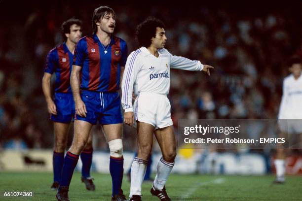 Barcelona's Migueli marks Real Madrid's Hugo Sanchez tightly