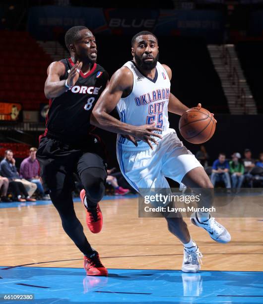 Reggie Williams of the Oklahoma City Blue drives against Bubu Polk of the Sioux Falls Skyforce during an NBA D-League game on March 30, 2017 at the...