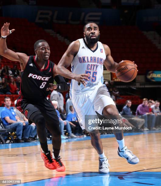 Reggie Williams of the Oklahoma City Blue drives against Bubu Polk of the Sioux Falls Skyforce during an NBA D-League game on March 30, 2017 at the...