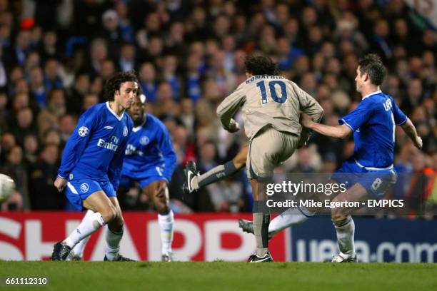 Barcelona's Ronaldinho scores his sides 2nd goal against Chelsea