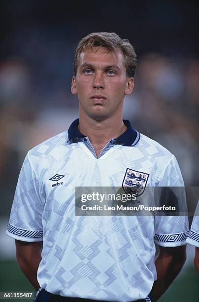 England midfielder David Platt pictured standing during the anthems before the 1990 FIFA World Cup quarterfinal game between Cameroon and England at...