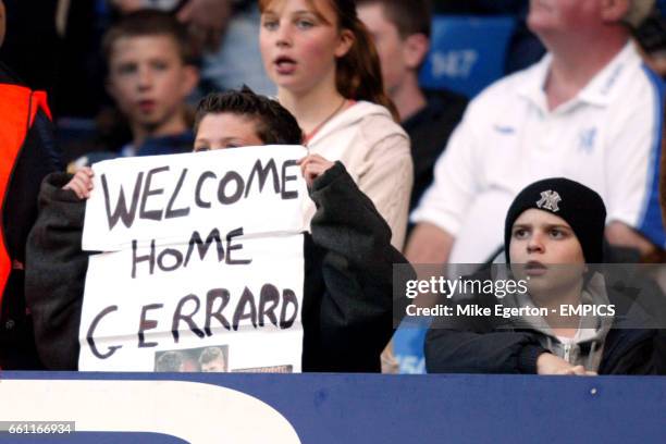 Chelsea fans with a 'welcome home' message for Liverpool's Steven Gerrard