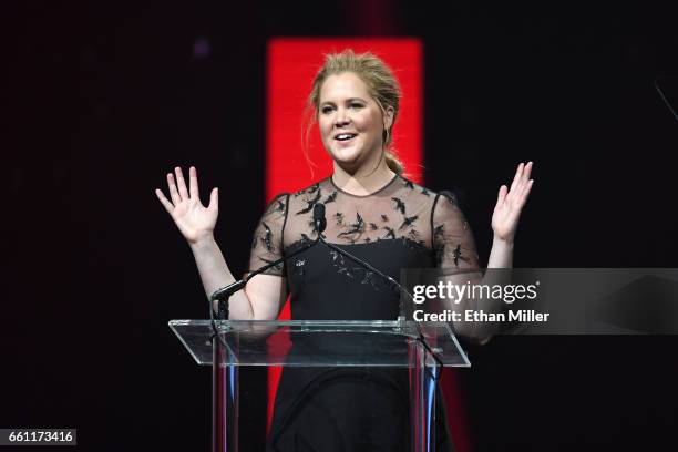 Actress/comedian Amy Schumer introduces Cinema Icon Award winner Goldie Hawn during the CinemaCon Big Screen Achievement Awards brought to you by the...