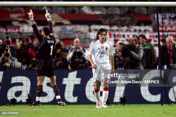Liverpool's Jerzy Dudek celebrates saving a penalty from AC Milan's Andrea Pirlo