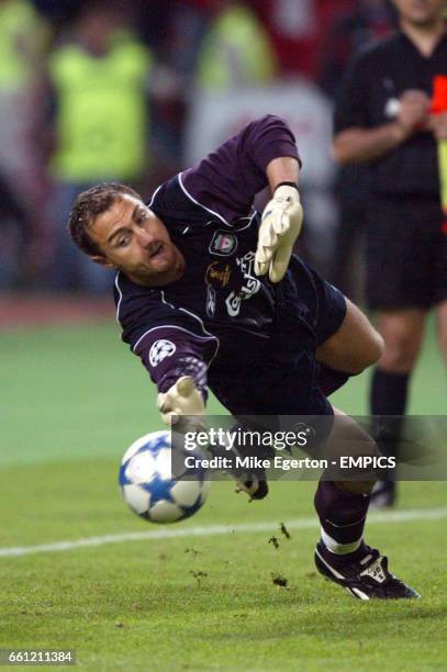 Liverpool's goalkeeper Jerzy Dudek saves the second penalty in the shoot out from AC Milan's Andrea Pirlo