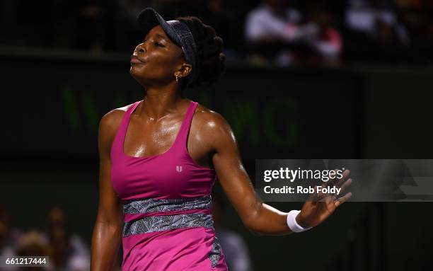 Venus Williams gestures during the semifinals match against Johanna Konta of Great Britain on day 11 of the Miami Open at the Crandon Park Tennis...