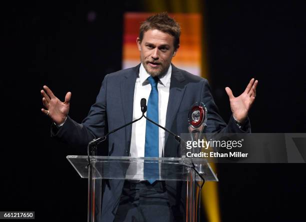 Actor Charlie Hunnam accepts the Male Star of the Year Award during the CinemaCon Big Screen Achievement Awards brought to you by the Coca-Cola...