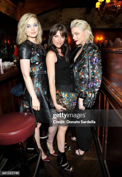 Actors Bella Heathcote, Selma Blair, and Chloe Grace Moretz attend the Coach & Rodarte celebration for their Spring 2017 Collaboration at Musso &...