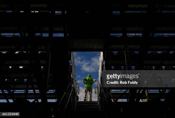 Volunteer looks on from the grandstands on day 11 of the Miami Open at the Crandon Park Tennis Center on March 30, 2017 in Key Biscayne, Florida.