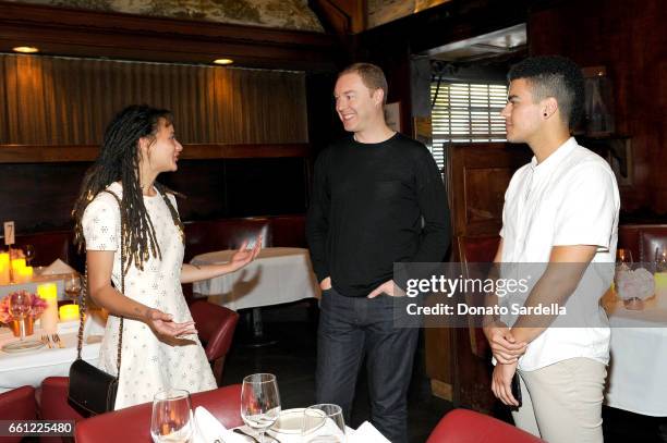 Actor Sasha Lane, Coach Creative Director Stuart Vevers and Sergio Darcy Lane attend the Coach & Rodarte celebration for their Spring 2017...