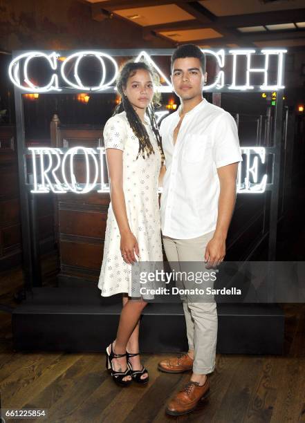 Actor Sasha Lane and Sergio Darcy Lane attend the Coach & Rodarte celebration for their Spring 2017 Collaboration at Musso & Frank on March 30, 2017...