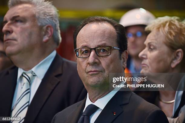 French President Francois Hollande , next to MP Frederic Cuvillier, visits the industrial site of the Outreau Technologies company in Outreau,...