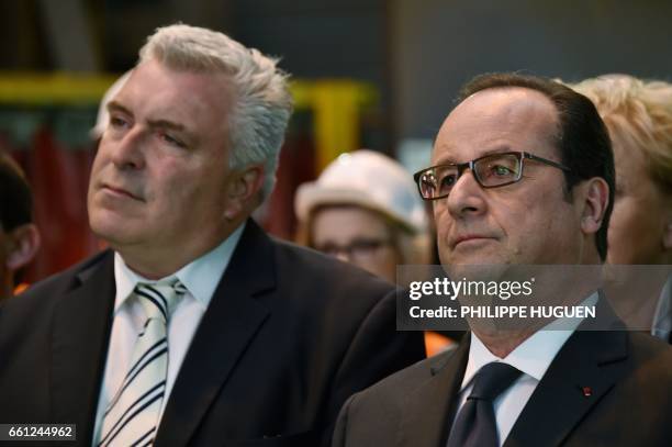 French President Francois Hollande , next to MP Frederic Cuvillier, visits the industrial site of the Outreau Technologies company in Outreau,...