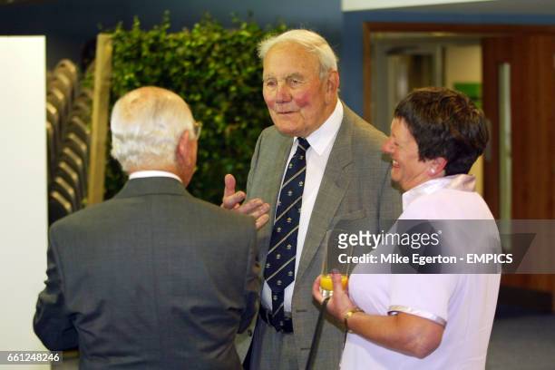 One of the Bedser twins chat to fellow guests at the opening of the OCS stand of the Brit Oval