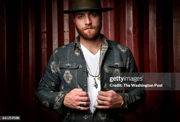 Washington Capitals goalie Braden Holtby poses for photos during a fashion shoot at Union 206 Studios on Tuesday, March 7, 2017. This outfit consist...