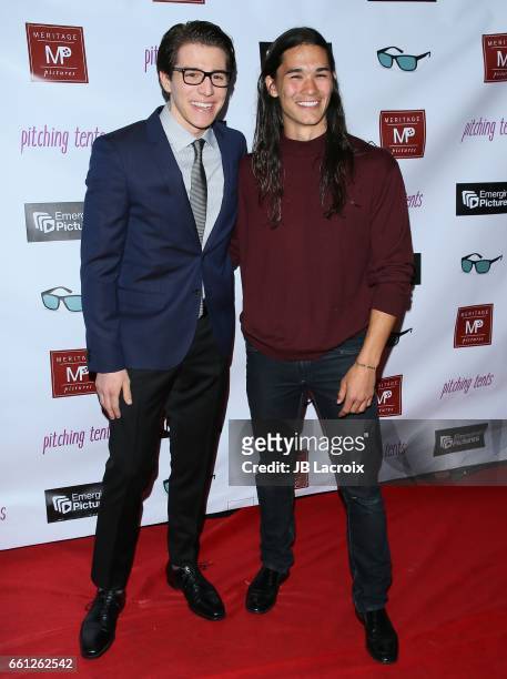 Booboo Stewart and Michael Grant attend the premiere of Meritage Pictures' 'Pitching Tents' on March 30, 2017 in Santa Monica, California.