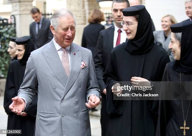 Prince Charles, Prince of Wales with religious leaders as he visits Stavropoleos Church during a walking tour of the Old Town on the third day of his...