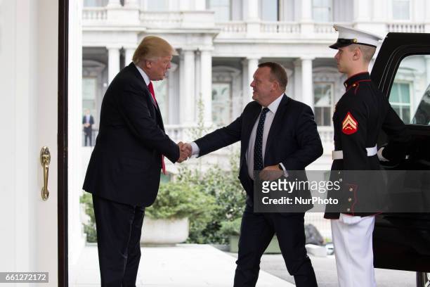 President Donald Trump meets Prime Minister Lokke Rasmussen of Denmark outside the West Wing of the White House March 30, 2017 in Washington, DC....
