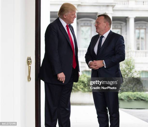 President Donald Trump meets Prime Minister Lokke Rasmussen of Denmark outside the West Wing of the White House March 30, 2017 in Washington, DC....