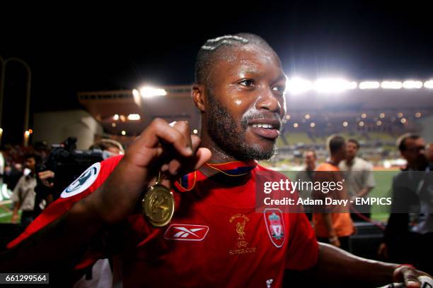 Liverpool's Djibril Cisse celebrates at the end of the game