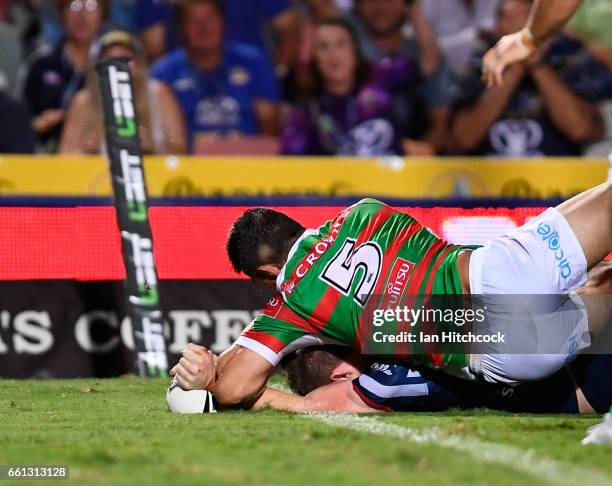 Michael Morgan of the Cowboys scores a try during the round five NRL match between the North Queensland Cowboys and the South Sydney Rabbitohs at...