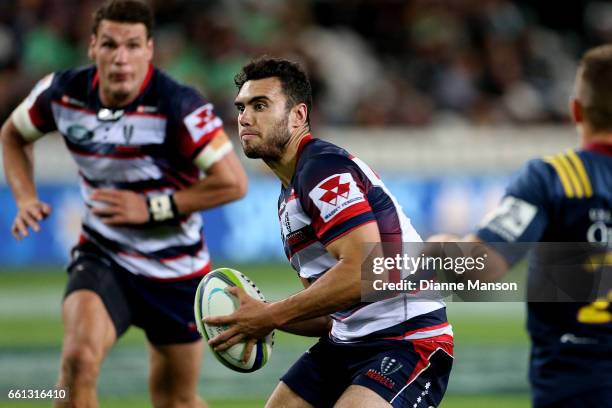 Jack Debreczeni of the Rebels looks to pass the ball during the round six Super Rugby match between the Highlanders and the Rebels at Forsyth Barr...