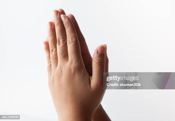 female hand showing prayer hand namaste sawasdee - 祈る 手 ストックフォトと画像