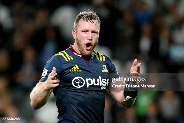 Gareth Evans of the Highlanders celebrates his try during the round six Super Rugby match between the Highlanders and the Rebels at Forsyth Barr...