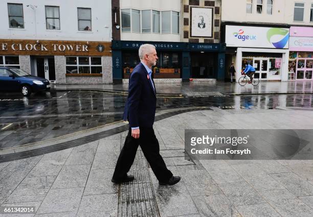 Labour leader Jeremy Corbyn walks through Stockton high street on March 31, 2017 in Middlesbrough, England. During the visit he was also joined by...