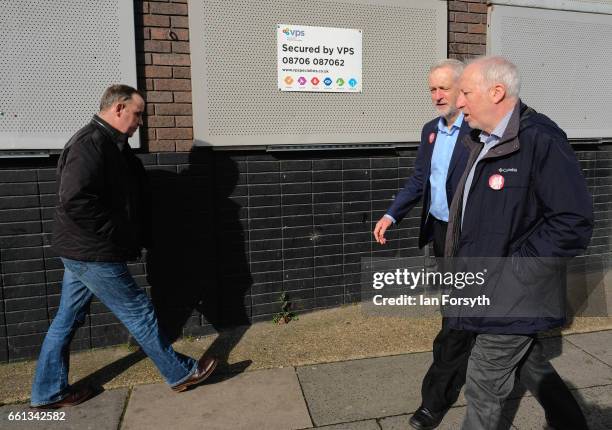 Labour leader Jeremy Corbyn walks through Stockton high street on March 31, 2017 in Middlesbrough, England. During the visit he was also joined by...