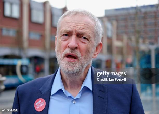 Labour leader Jeremy Corbyn walks through Stockton high street on March 31, 2017 in Middlesbrough, England. During the visit he was also joined by...