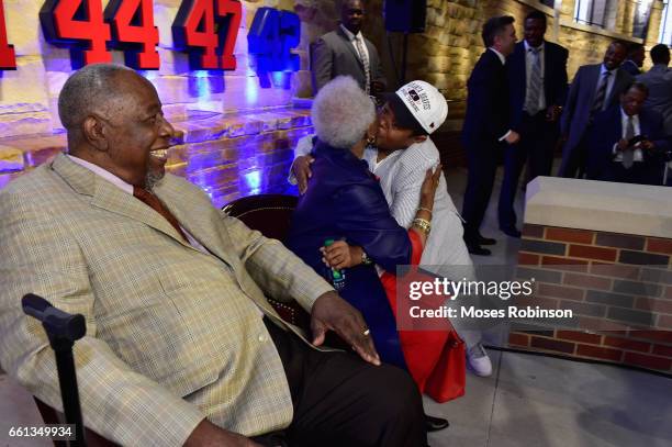 Actor Emmanuel Lewis greets Former MLB and Hall of Fame Player Hank Aaron and his wife Billye Aaron at the Atlanta Braves Unveil A New Statue Of Hank...