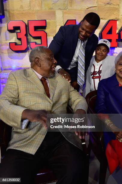 Former MLB and Hall of Fame Player Hank Aaron, comedian/actor Chris Tucker, actor Emmanuel Lewis attend the Atlanta Braves Unveil A New Statue Of...