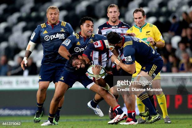 Amanaki Mafi of the Rebels tries to break the Highlanders defence during the round six Super Rugby match between the Highlanders and the Rebels at...