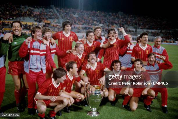 Liverpool players and coaching staff celebrate with the European Cup: Bruce Grobbelaar, Kenny Dalglish, Steve Nicol, Alan Hansen, Michael Robinson,...